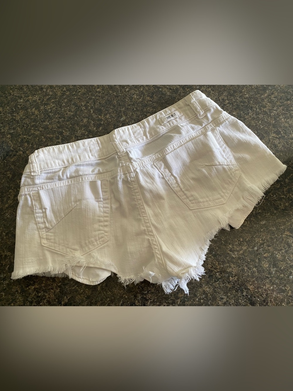 Brandy Melville white stretchy denim jean shorts. - Picture 8 of 8